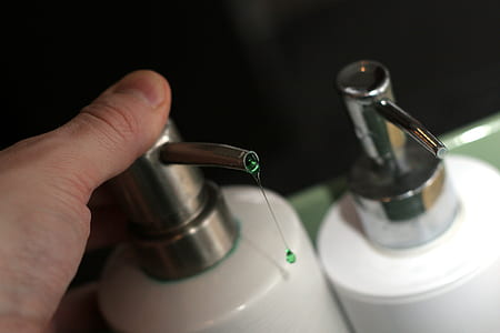 person holding bottle pump thumbnail