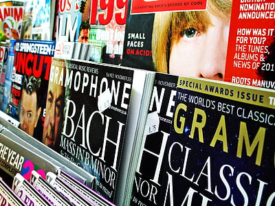pile of magazines on rack thumbnail