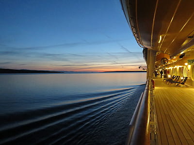 ship travelling during blue hour thumbnail