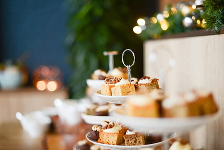 selective focus photography of brownies on 3-tier cupcake racks thumbnail