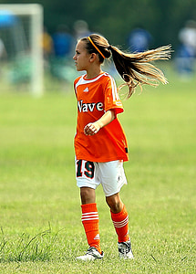 girl on grass field thumbnail