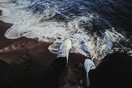 person sitting shore thumbnail
