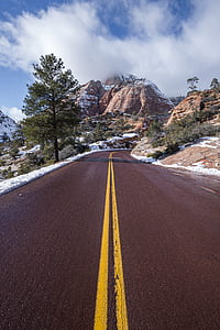 photography of yellow line on road thumbnail