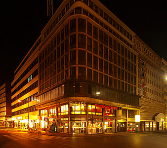 gray building at night thumbnail