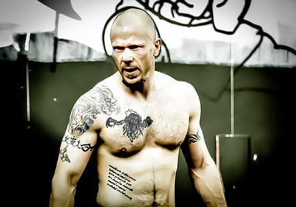 topless man with tattoo thumbnail