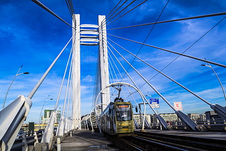 Bridge With Train Under Blue Sky thumbnail