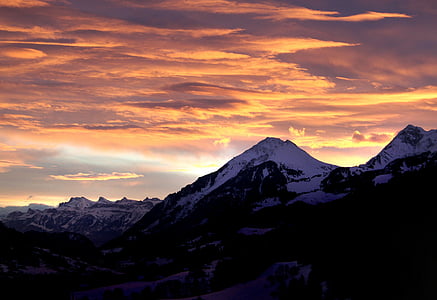 mountain range covered by snow at daytime thumbnail