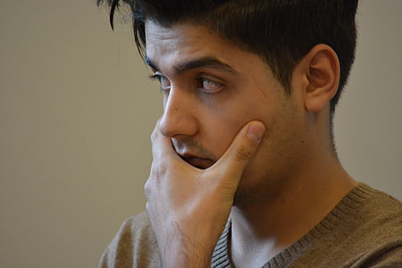 man holding his face thumbnail