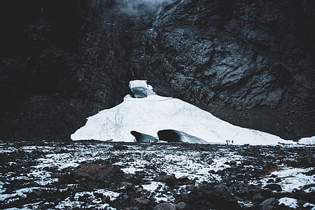 photography of rock coated snow thumbnail