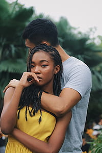 selective focus photograph of man leaning on woman thumbnail