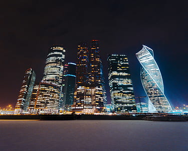 high-rise building cityscape under night sky thumbnail
