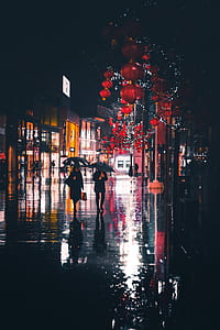 two people walking white holding umbrellas thumbnail