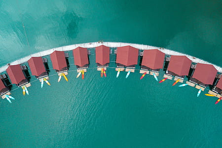 aerial view of red huts thumbnail