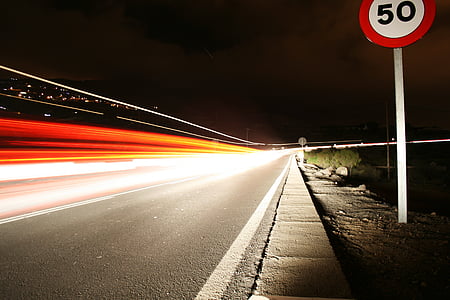 concrete highway at night time thumbnail