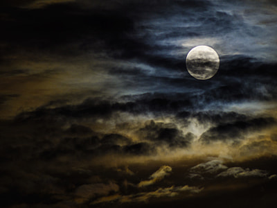 full moon on cloudy sky thumbnail