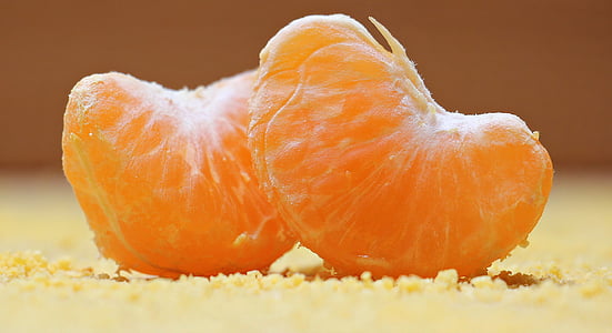 focused photo of two slices of oranges thumbnail