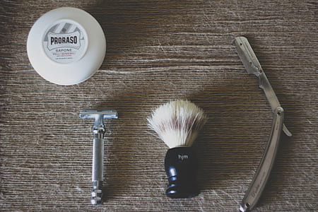 silver shaver near black and white brush thumbnail