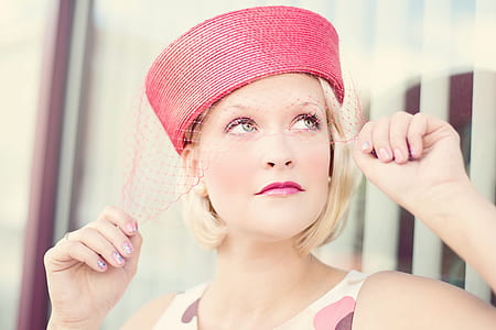 woman with red lipstick and red hat thumbnail
