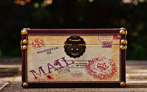 maroon and brown train case closeup photo thumbnail