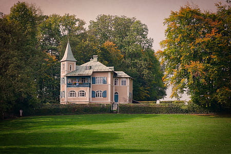 brown and gray 3-storey house thumbnail