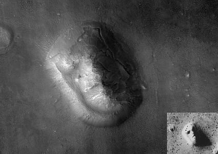 grayscale photo of engraved human face thumbnail