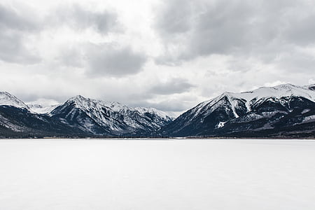 clouds over mountain range thumbnail