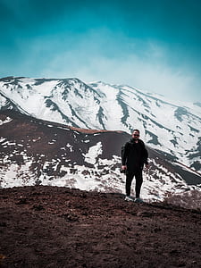 man standing on mountain thumbnail