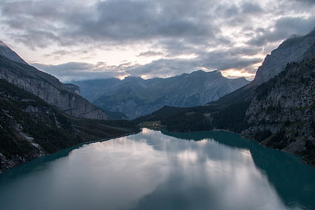 body of water and mountains thumbnail