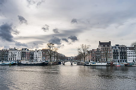 photo of boats docked near street thumbnail