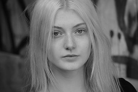 grayscale photo of woman wearing black top thumbnail