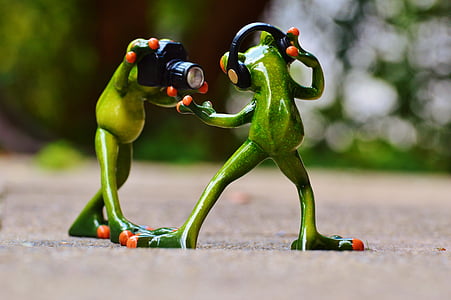 two green ceramic frog decors thumbnail