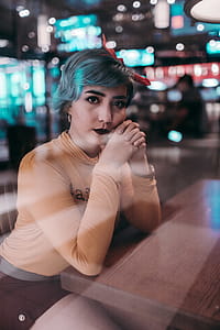 Woman Leaning on Table thumbnail