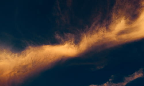 low-angle photography of orange clouds and blue sky thumbnail