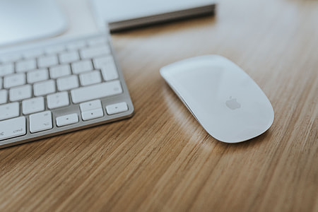 White Apple iMac computer with elephant mousepad thumbnail