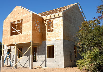 beige and gray concrete house thumbnail
