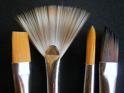 closeup photography of four makeup brushes thumbnail