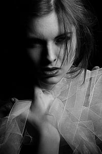 woman holding shawl thumbnail