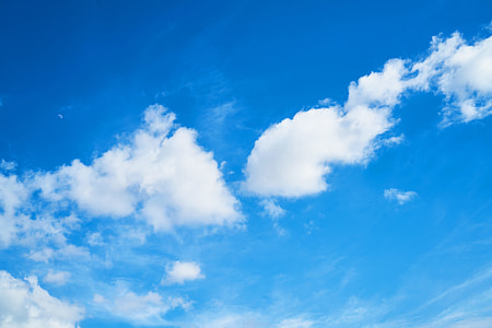 low angle photo of white clouds and blue sky at daytime thumbnail