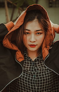 Photography of a Woman Wearing Jacket thumbnail