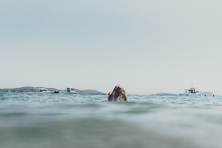 person swimming in the sea thumbnail