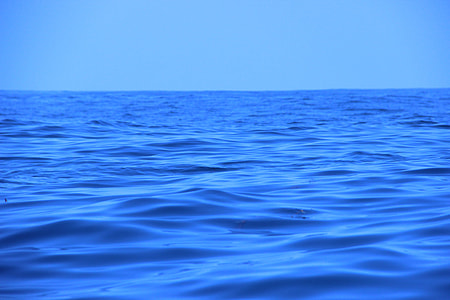 ocean waves under blue sky thumbnail