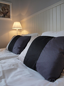 white wooden bed and comforter set thumbnail