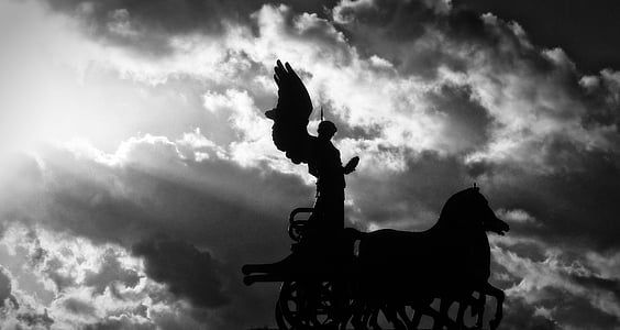silhouette of angel riding carriage thumbnail