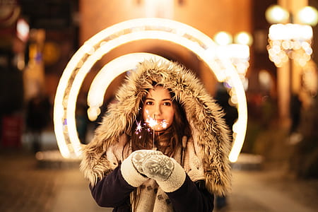 woman wearing black and brown parka jacket thumbnail