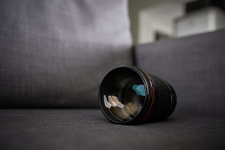 black DSLR lens thumbnail