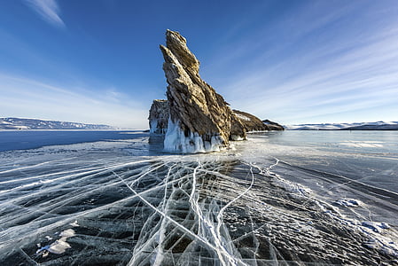 brown rock on sea thumbnail