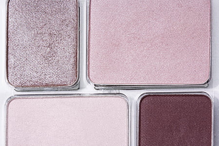 three assorted-color makeup cases thumbnail