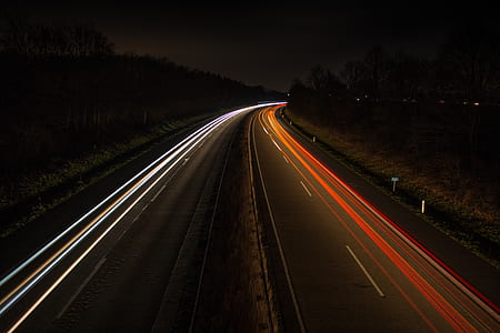 timelapse photography of cars passing through north and south thumbnail