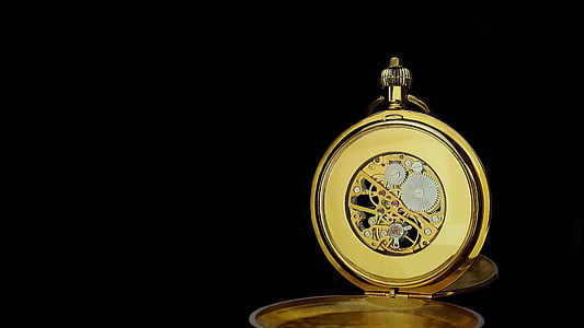 round gold-colored pocket watch thumbnail