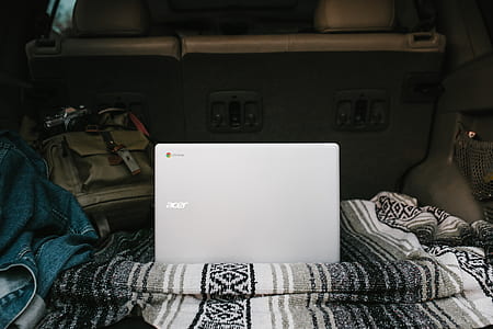 white Acer laptop computer at the compartment thumbnail